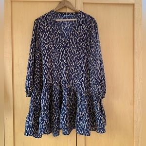 Tiered swing tunic or mini dress in graphic animal print.